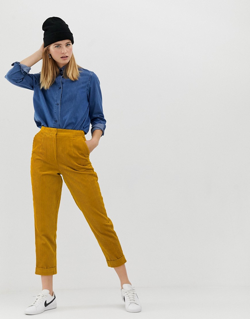 ASOS DESIGN jumbo cord tapered trousers with turn up