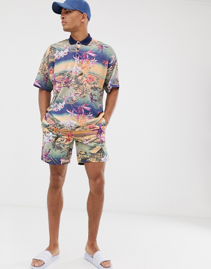 ASOS DESIGN co-ord swim shorts in floral souvenir print mid length