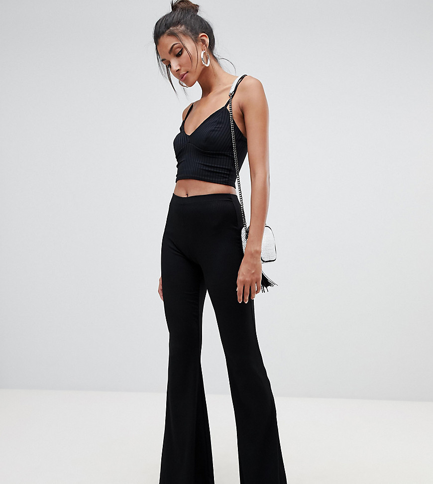 Missguided Tall ribbed kick flare trousers in black