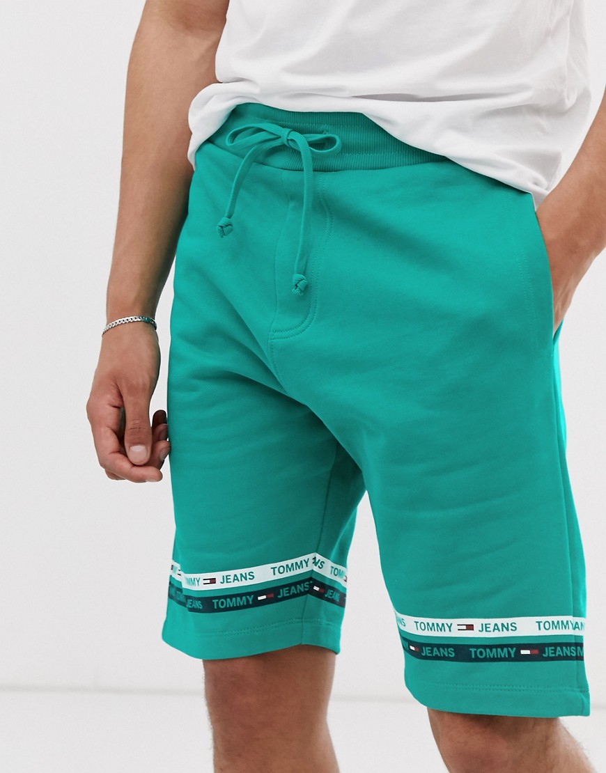Tommy Jeans sweat short with leg taping in green
