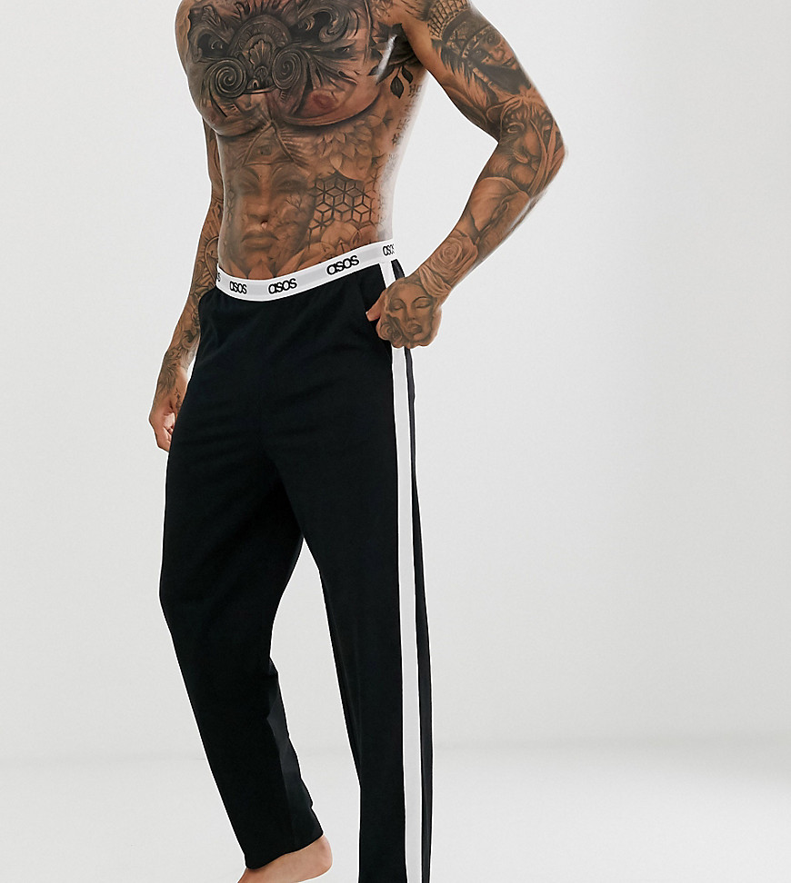 ASOS DESIGN lounge pyjama bottom in black with side stripe and branded waistband