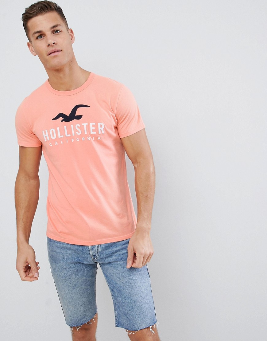 Приталенная футболка персикового цвета с большим логотипом Hollister I 
