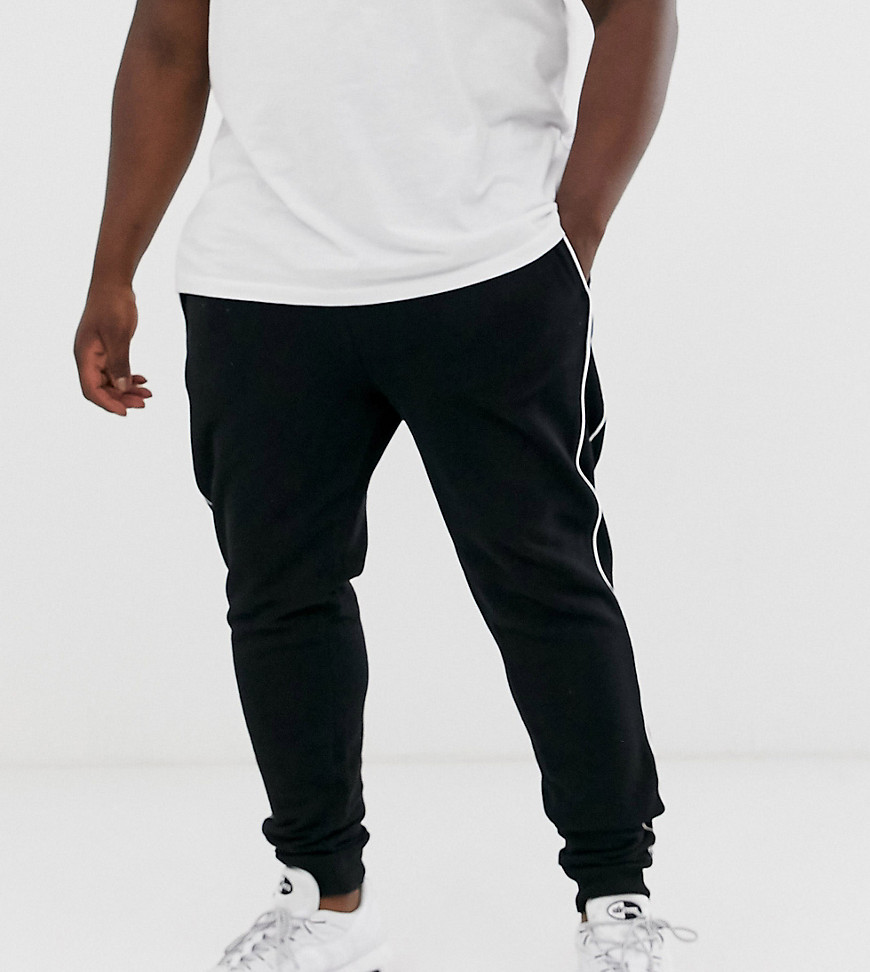 ASOS DESIGN Plus skinny joggers with piping in black