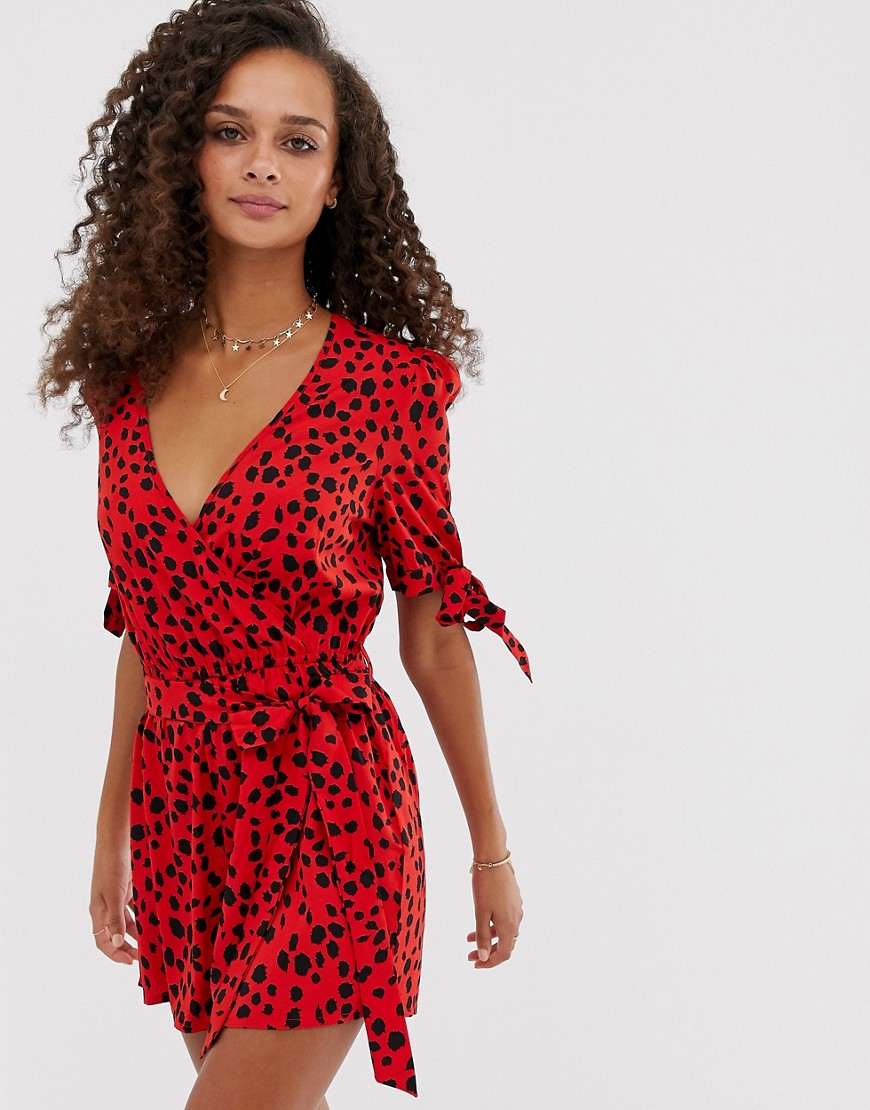 Influence wrap front playsuit in splodge print