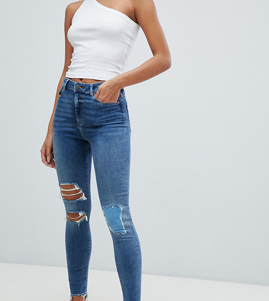 Asos Design Ridley High Waist Skinny Jeans In Extreme Mid Wash With Busted Knee And Rip & Repair Detail-blue