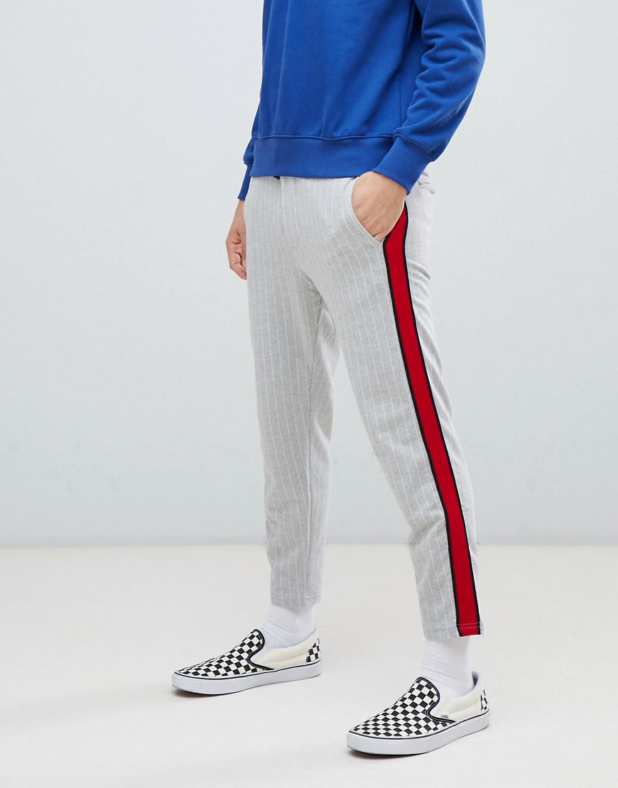 Bershka striped joggers in grey with red side stripe