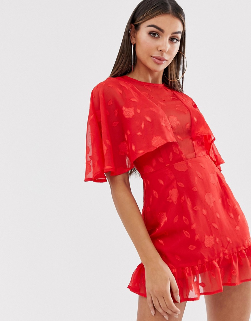 Lasula plunge cape mini dress with frill hem in red lace overlay