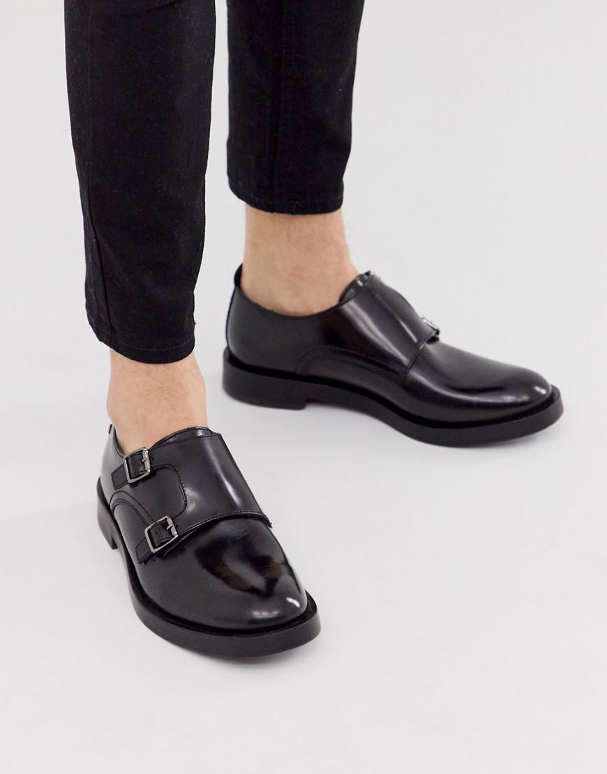 Base London Milligan double buckle monk shoes in black hi shine