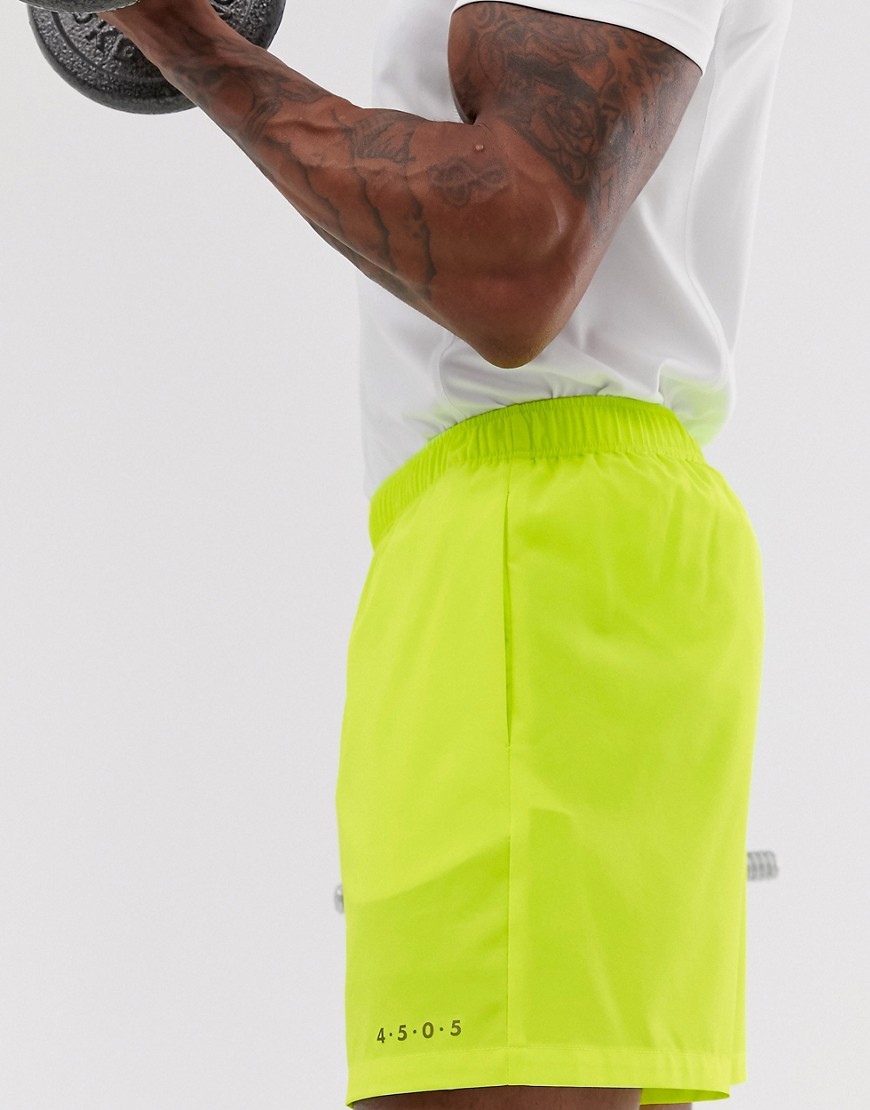 ASOS 4505 training shorts in mid length with quick dry in neon yellow