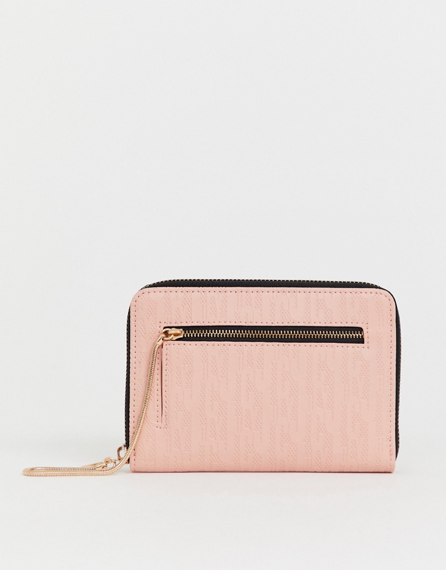 Juicy alexis embossed medium zip around purse in pink