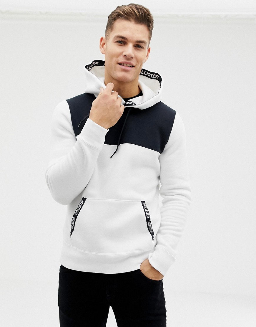Hollister colourblock taped logo pockets hoodie in white/black