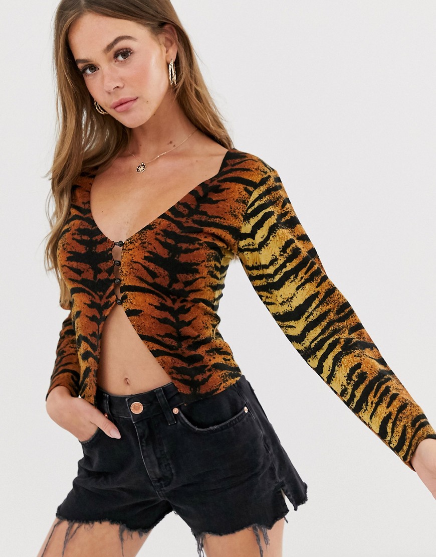 Sacred Hawk knitted button front top in tiger print