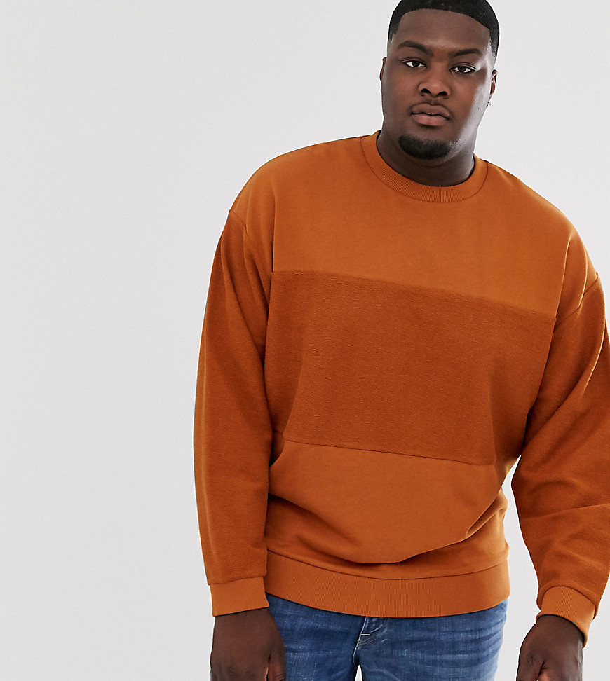 ASOS DESIGN Plus oversized sweatshirt with reverse panel in rust