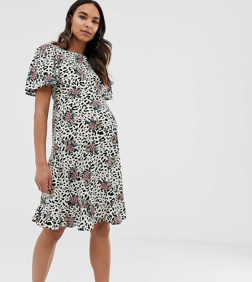 Queen Bee Maternity shift dress with fluted hem in floral leopard