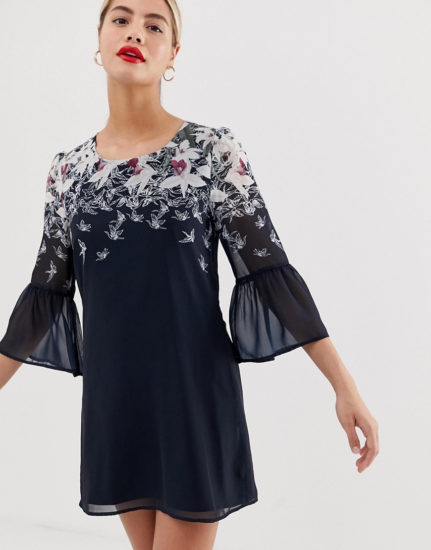 Yumi shift dress with trumpet sleeve detail in butterfly print