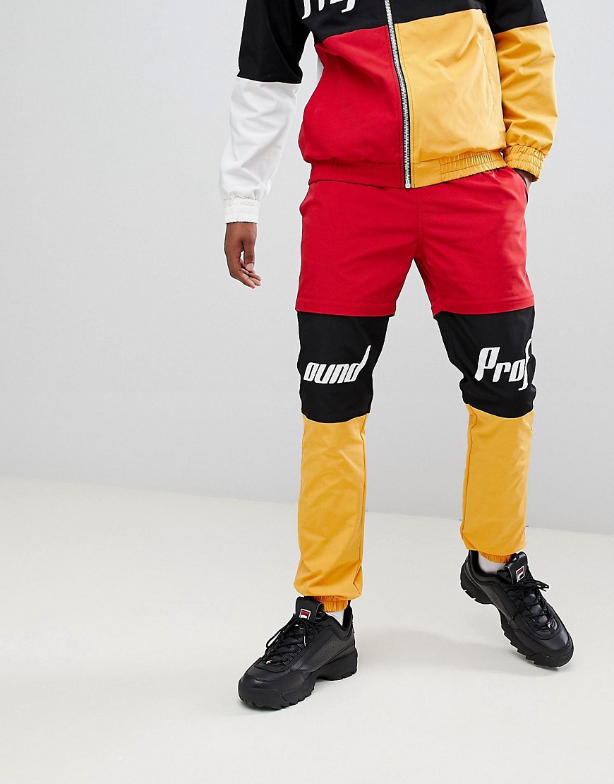Profound Aesthetic racing track joggers in multi
