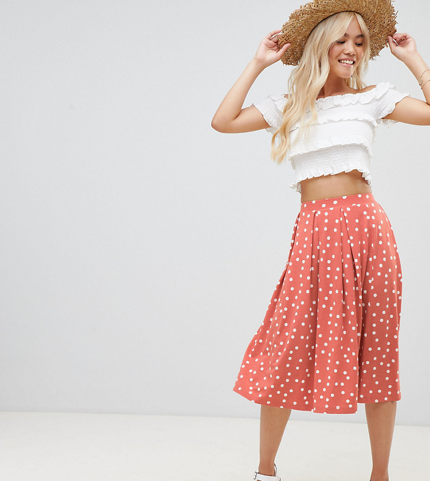 ASOS DESIGN Petite midi skirt with box pleats in polka dot - Rose / white spot