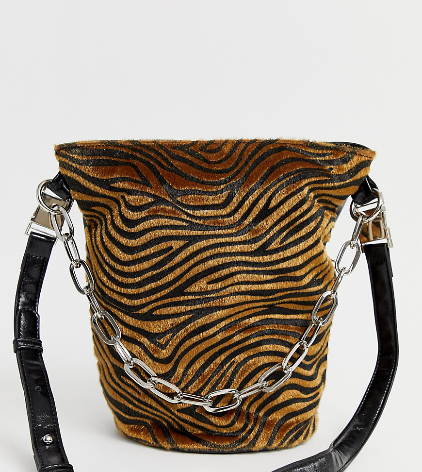 Sacred Hawk tiger print bucket bag with chain detail