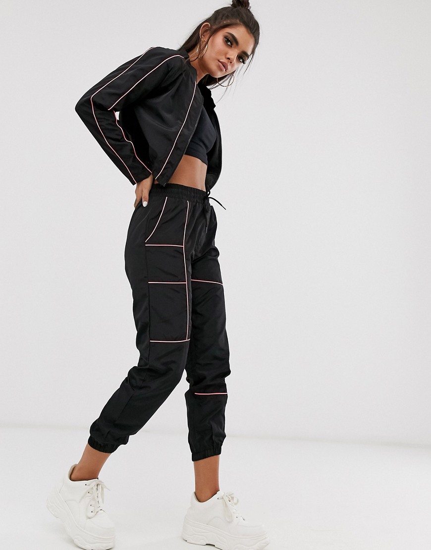 QED London contrast piping elasticated cuff joggers in black and pink