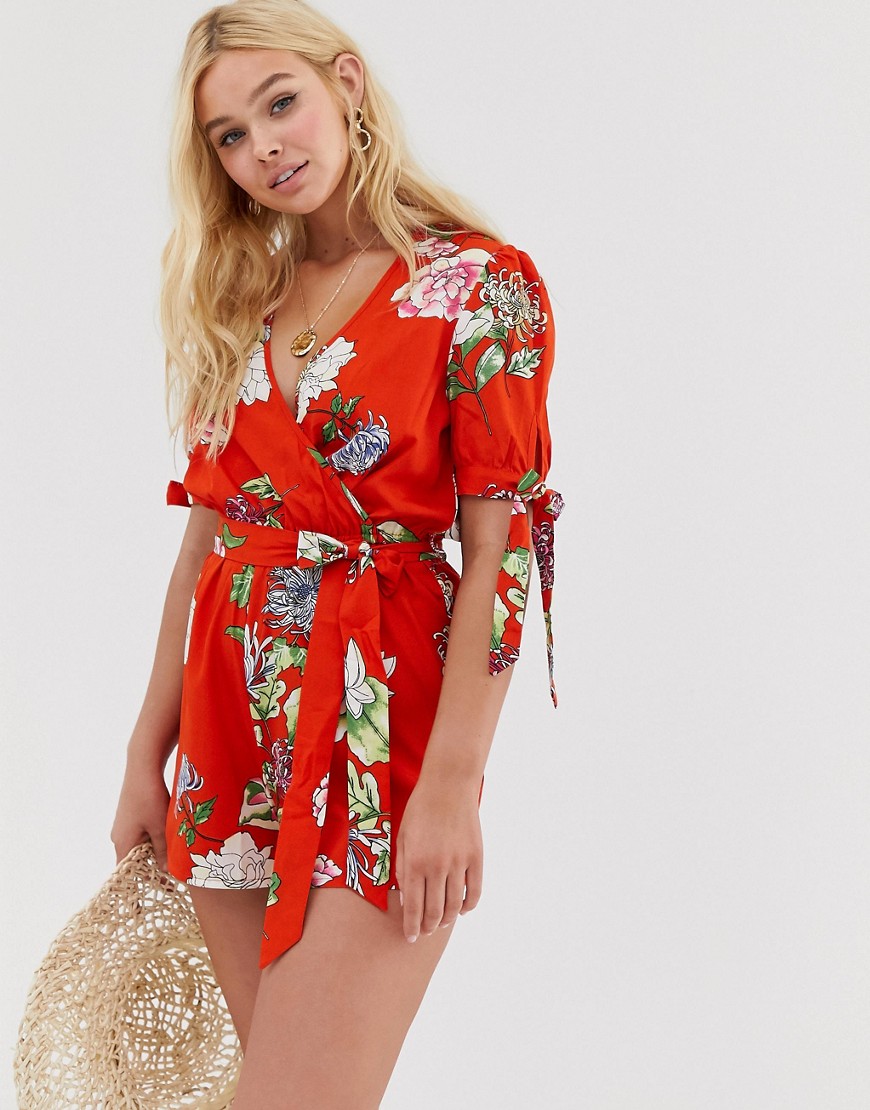 Influence wrap playsuit with puff tie sleeve in red floral