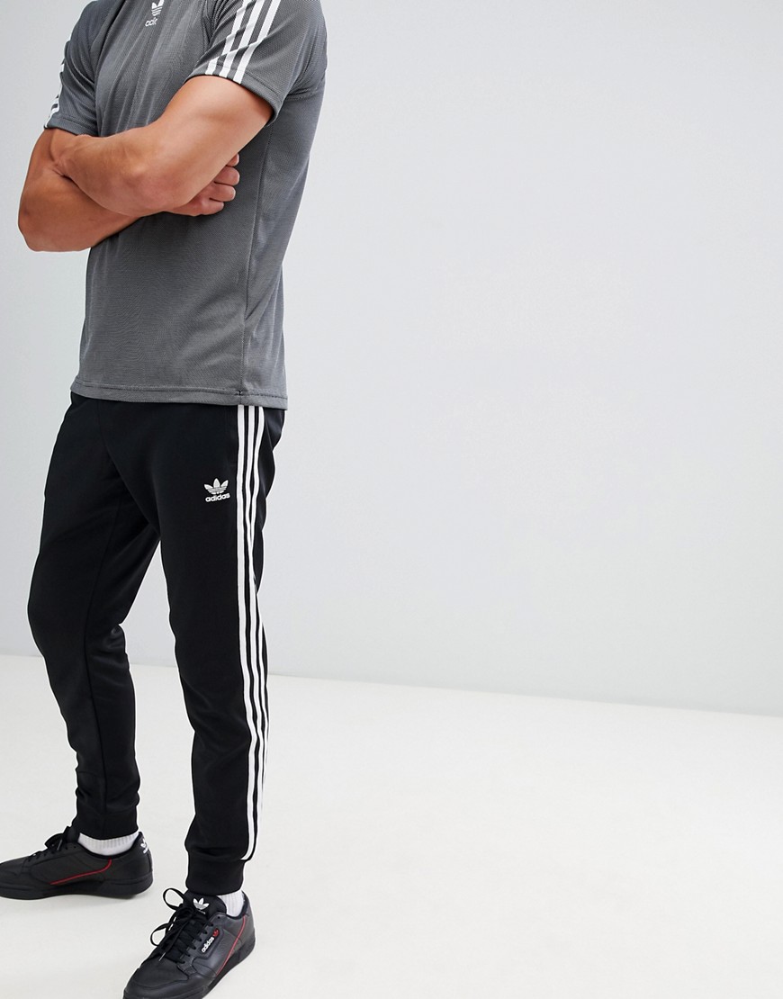 adidas originals superstar skinny joggers cuffed in black cw1275