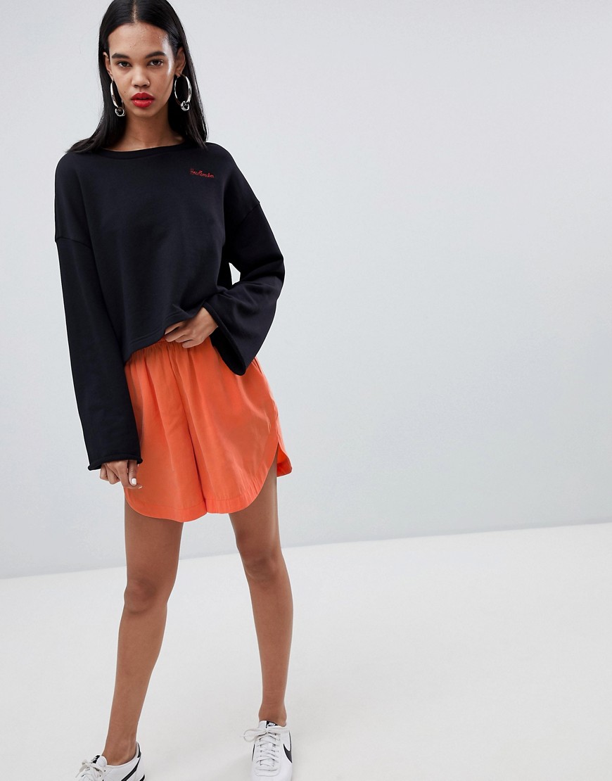 Weekday peach feel shorts in orange and red - Orange and red
