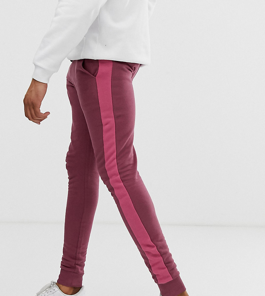 ASOS DESIGN Tall skinny joggers with side stripe in purple