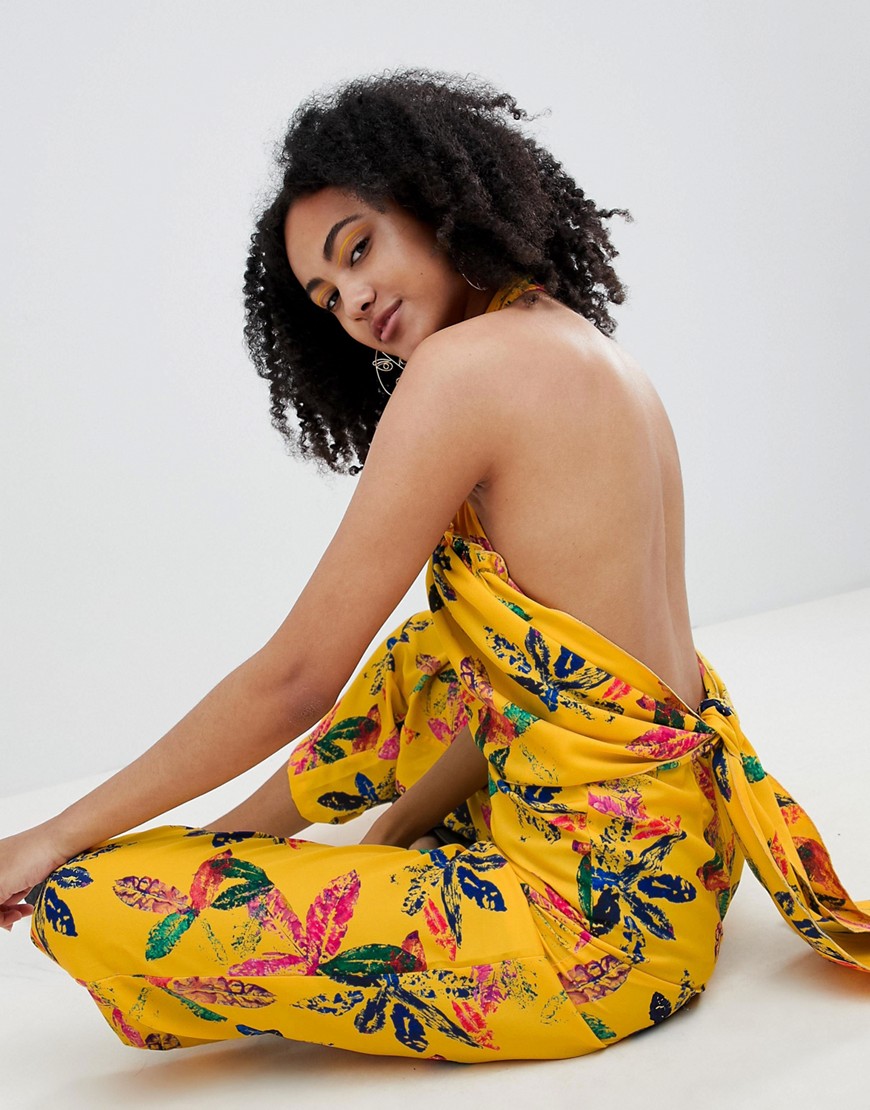 ASOS Made In Kenya x 2ManySiblings High Neck Frill Jumpsuit In Yellow Floral - Yellow floral print
