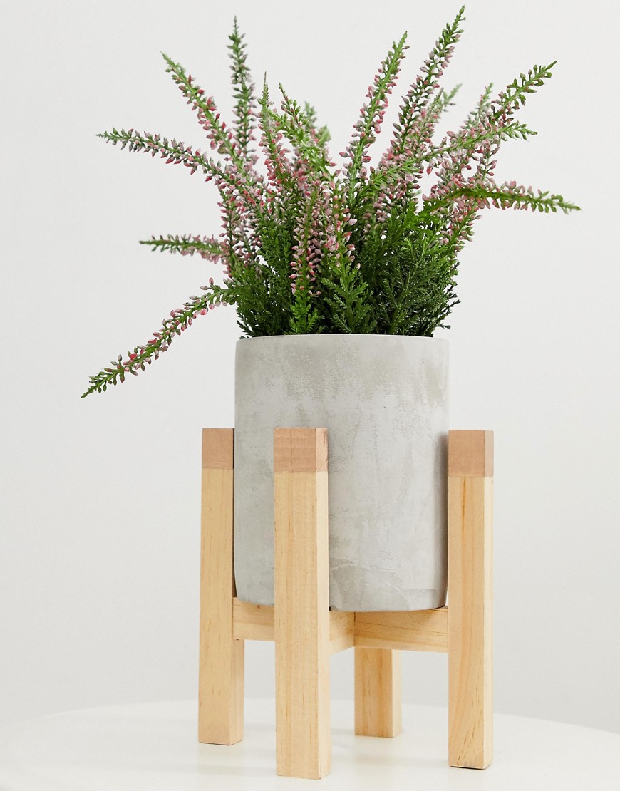 Chickidee concrete plant pot on wooden stilts