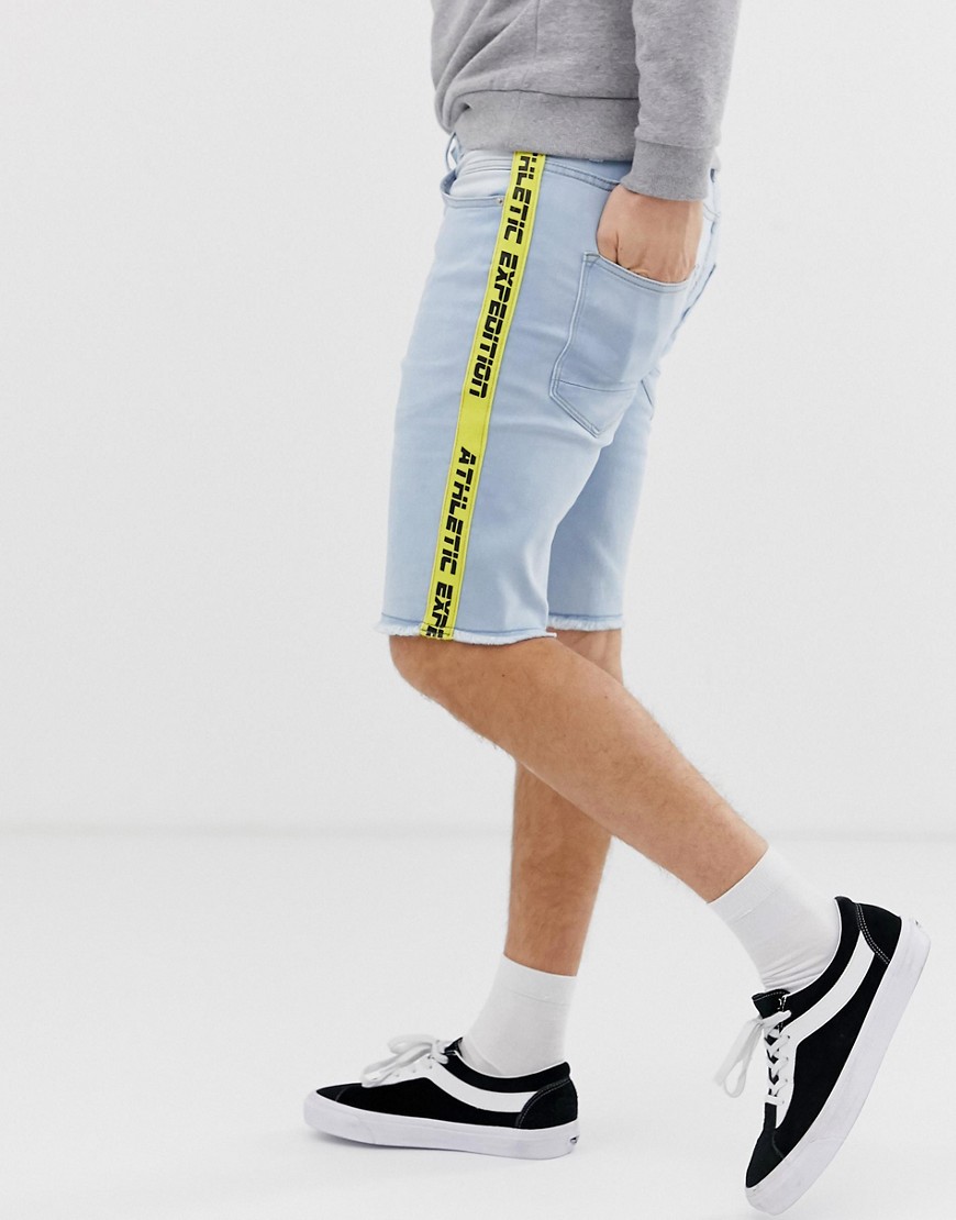Solid regular fit denim shorts with  taping in bleach wash blue