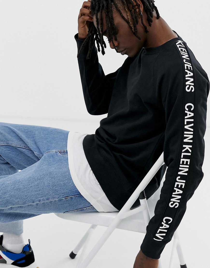 Calvin Klein Jeans side stripe logo crew neck sweatshirt in black/white