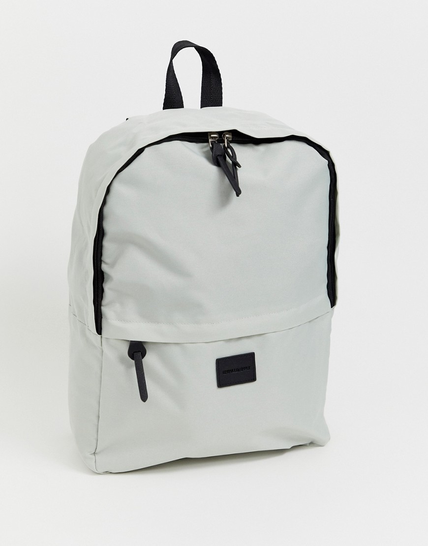 ASOS DESIGN backpack in grey with branded patch