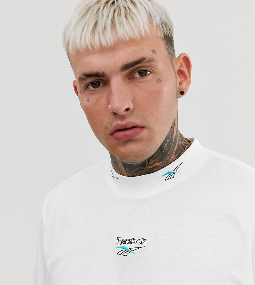 Reebok long sleeve t-shirt with neck logo detail in white Exclusive to Asos