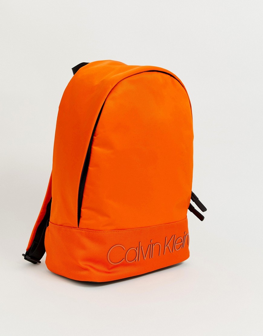 Calvin Klein Shadow logo backpack in orange