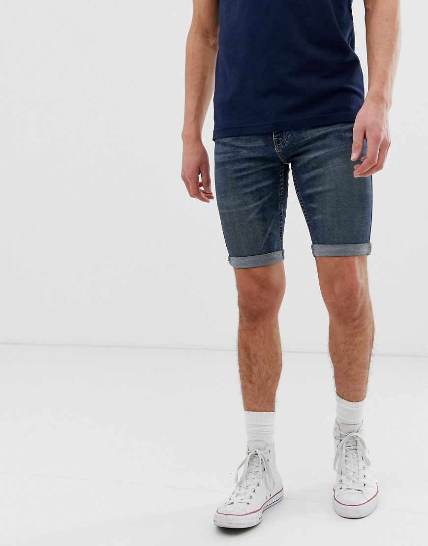 Hollister super skinny destroyed denim shorts in medium wash
