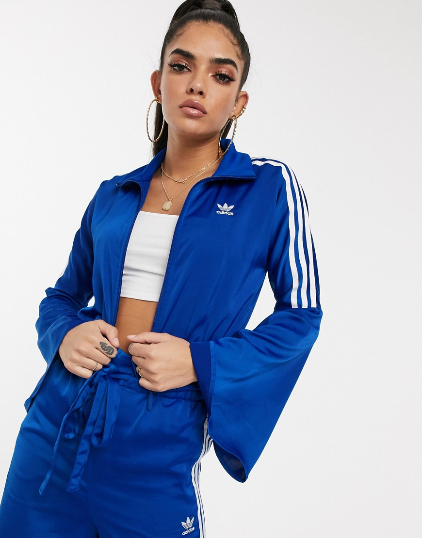 adidas Originals Bellista bell sleeve track jacket in blue