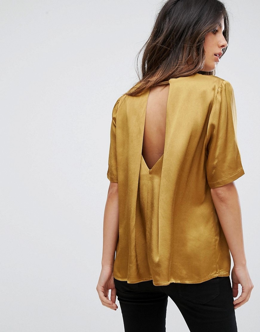 Soaked In Luxury Cut Out Back Metallic Blouse