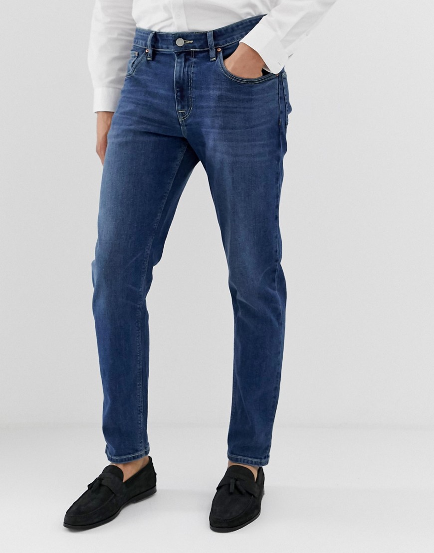 ASOS DESIGN tapered jeans in dark wash