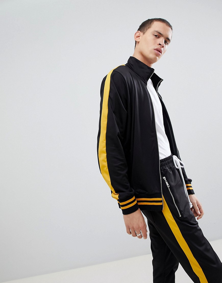 Criminal Damage Track Jacket In Black With Yellow Side Stripe