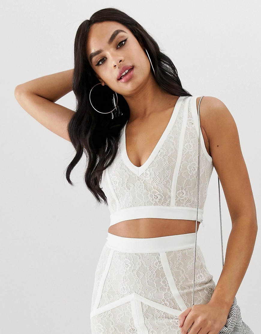 The Girlcode plunge front bandage crop top with lace in cream co-ord