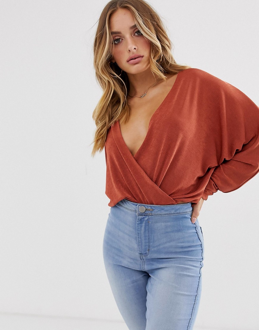 ASOS DESIGN wrap top in slinky fabric with batwing sleeve