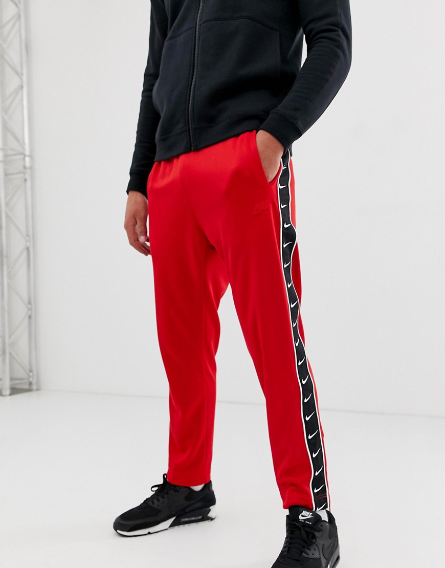 Nike Hybrid Joggers In Red