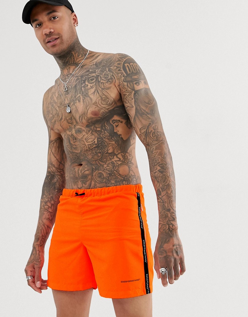 Good For Nothing swim shorts in orange with logo taping