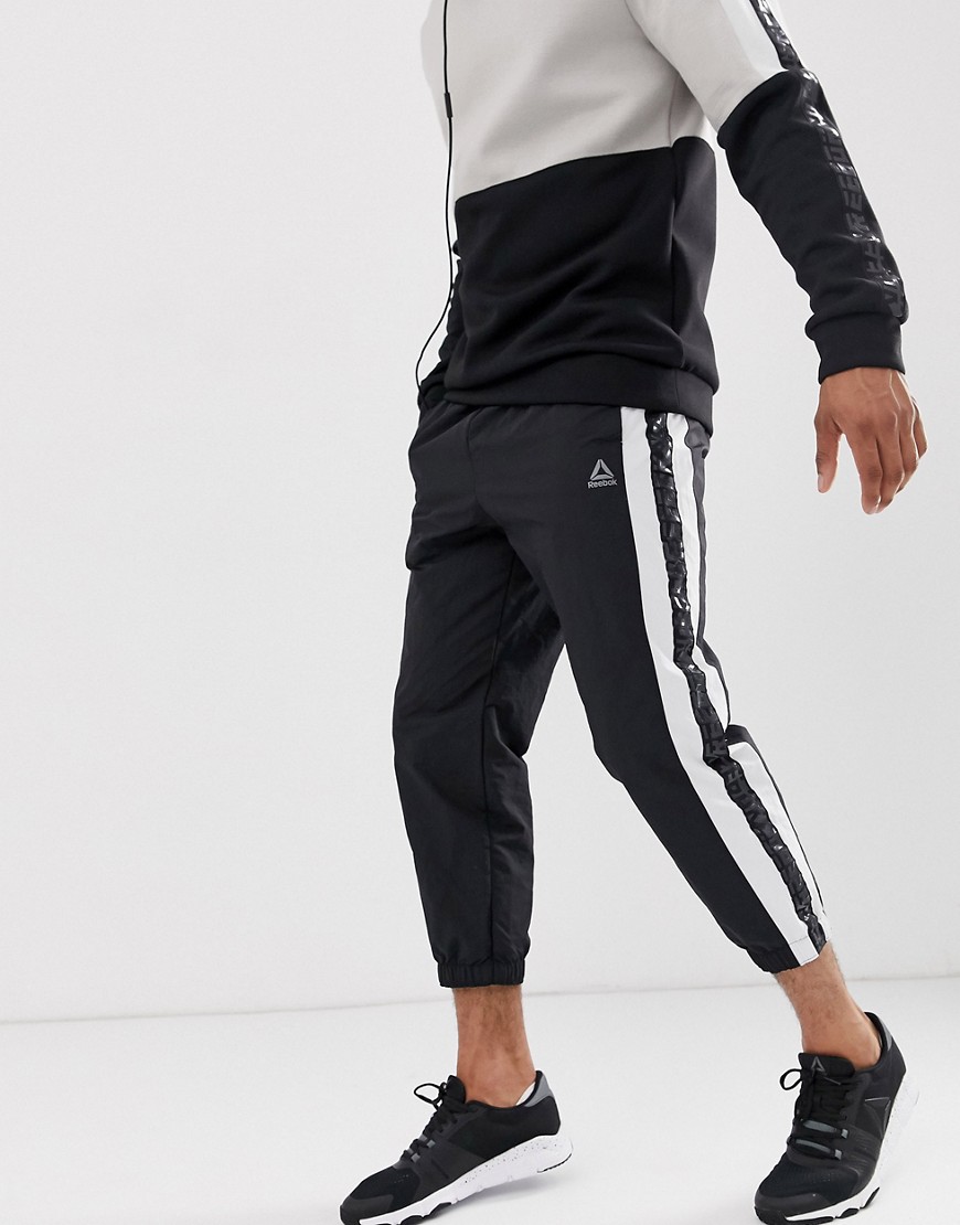 Reebok meet you there tapered tape joggers in black