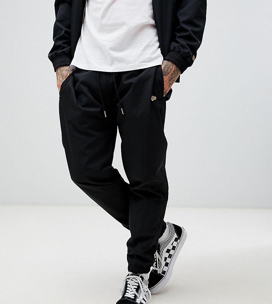 New Era track joggers in black exclusive to asos