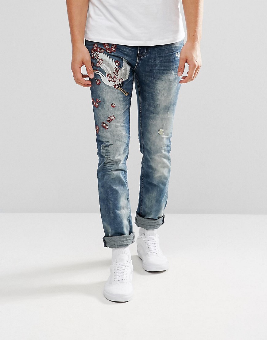 Illegal Club Skinny Jeans In Midwash Blue With Embroidery - Blue