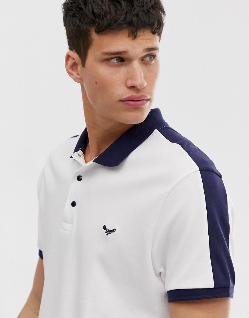 Threadbare polo shirt with cut and saw panels