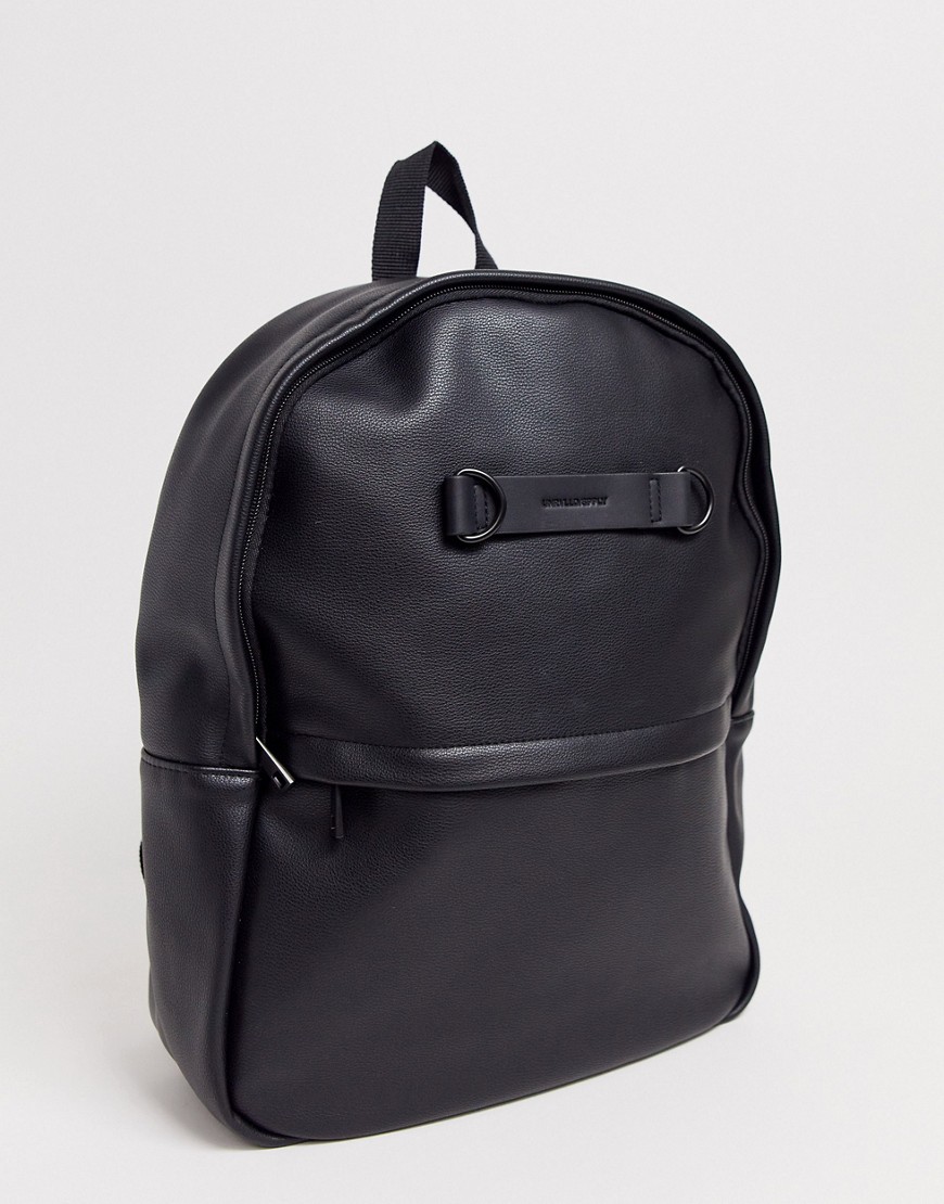 ASOS DESIGN faux leather backpack in black with d-ring logo detail