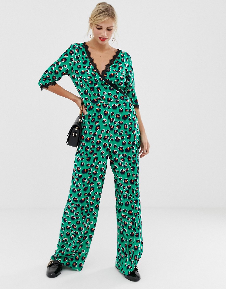 Liquorish wrap front jumpsuit in bright leopard print with lace trim sleeve detail