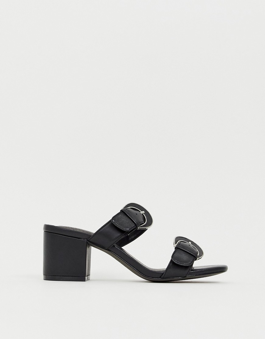 E8 by Miista black leather mid block heel buckle detail sandals